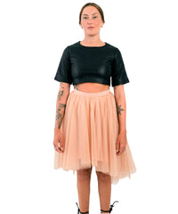 High-Low SkirtWho doesn't love a tutu Our update tutu is the perfect party accessory. Made from sustainable materials, the high low cut is fun and flirty while the neutral color allows you to play with look. Dress it up with heels and a fun top or down wi