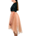 High-Low SkirtWho doesn't love a tutu Our update tutu is the perfect party accessory. Made from sustainable materials, the high low cut is fun and flirty while the neutral color allows you to play with look. Dress it up with heels and a fun top or down wi